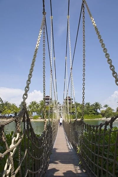 Wooden rope suspension bridge from Palawan beach to