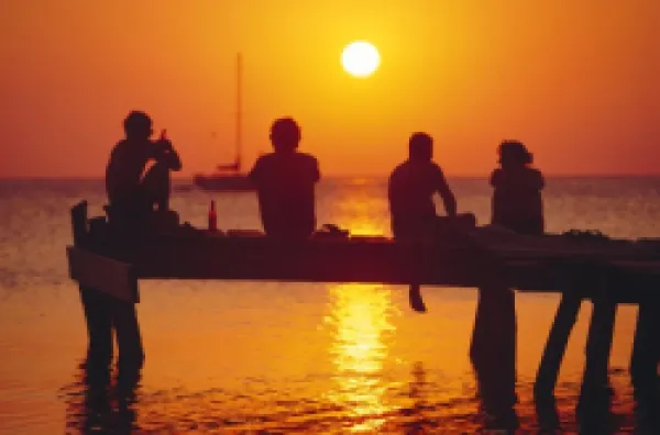 Buy Tourists enjoying the sunset
