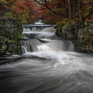 Autumnal waterfall along the Four Waterfalls walk, Waterfall Country, Brecon Beacons National Park, South Wales, United Kingdom, Europe