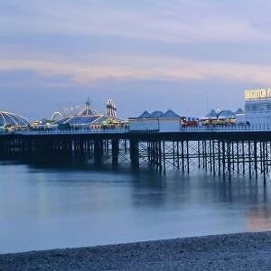 The beach and Palace Pier, Brighton, East Sussex, England, UK, Europe
