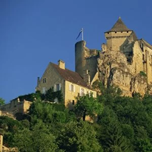 Castle perched on hill above the Dordogne River at Castelnaud in the Dordogne