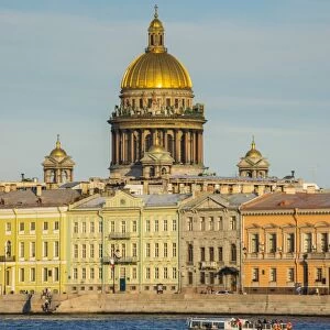 City center of St. Petersburg from the River Neva at sunset with the St. Isaac cathedral in the background, Russia, Europe