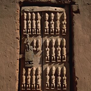 Close-up of granary door depicting ancestors of the Dogons, village in the Dogon area