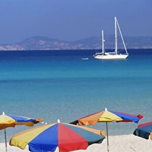 Colourful umbrellas on Playa de ses Illetes beach