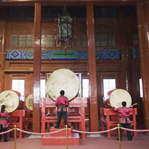 Drummers inside The Drum Tower, a later Ming dynasty version originally built in 1273 marking the centre of the old Mongol capital, Beijing