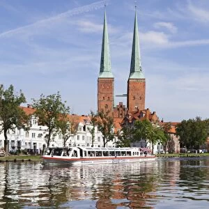 Excursion boat on the River Trave and cathedral, Stadttrave, Lubeck, Schleswig Holstein, Germany, Europe