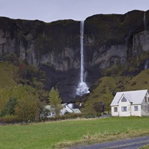 Farm and waterfall (Foss a Sidu), at Dverghamrar, east of Kirkjubaejarklaustur