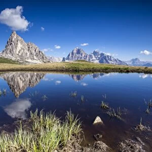The Gusela peak and the Tofane Group by Cortina D Ampezzo reflecting in the lake by Passo Giau, Veneto, Italy, Europe