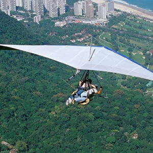 Hang-glider after taking off from Pedra Bonita, Rio de Janeiro, Brazil, South America