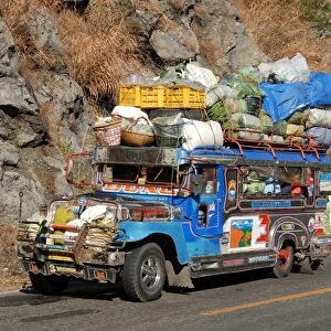 Heavily loaded jeepney, a typical local bus, on Kennon Road, Rosario-Baguio