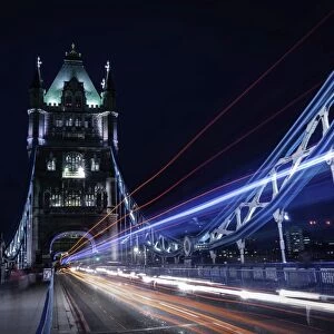 Light trails on London bridge in the evening, London, United Kingdom, Europe