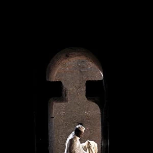 Man entering Bet Medhane Alem church in Lalibela, Wollo, Ethiopia, Africa