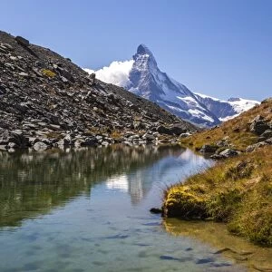 The Matterhorn at dawn seen from Stellisee, Zermatt, Canton of Valais, Pennine Alps