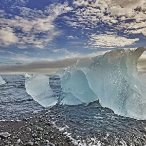 Melting glacial ice, carved from the Vatnajokull icecap, on the beach at Jokulsarlon