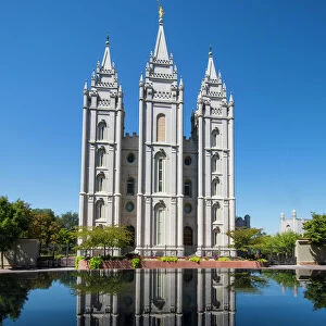 Mormon Salt Lake Temple reflecting in a little pond, Salt Lake City, Utah, United States of America, North America