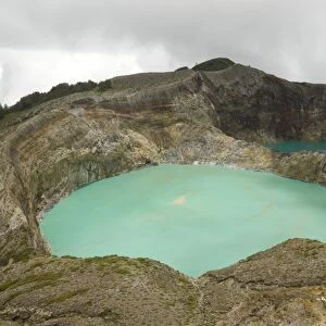 Multi-coloured crater lakes at summit of Kelimutu volcano, eastern Flores, Nusa Tenggara, Indonesia, Southeast Asia, Asia