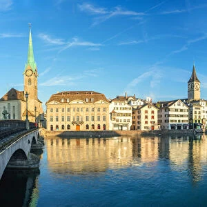 Panoramic of Fraumunster church and Limmat River seen from Munsterbrucke bridge at