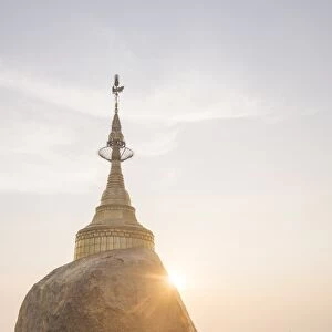 Pilgrims at Golden Rock Stupa (Kyaiktiyo Pagoda) at sunset, Mon State, Myanmar (Burma)