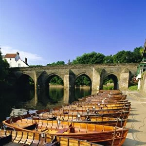 Rowing boats on River Wear and Elvet Bridge, Durham, County Durham, England, UK