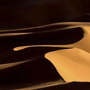 Shapes and shadows in dunes of the Erg Chebbi sand sea, part of the Sahara Desert near Merzouga