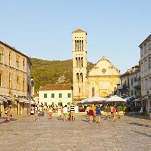 Tourists on holiday in St. Stephens Square, Hvar Town, Hvar Island, Dalmatian Coast, Croatia, Europe
