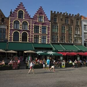 Tourists and visitors enjoying pavement cafes, Markt Square, Bruges, West Flanders
