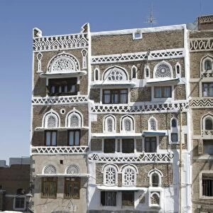 Traditional ornamented brick architecture on tall houses, Old City, Sana a
