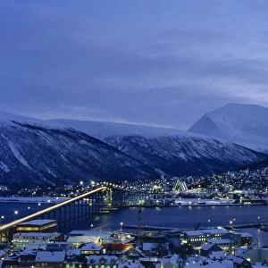 Tromso and its bridge to the mainland at dusk
