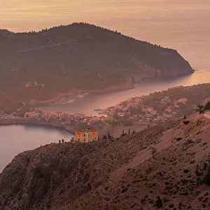 View of Assos, coastline, sea and hills at sunset, Assos, Kefalonia, Ionian Islands, Greek Islands, Greece, Europe