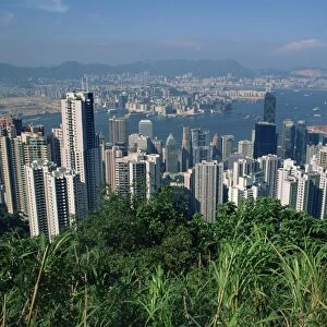 View from Victoria Peak over the city skyline of Hong Kong Island to Kowloon in the distance