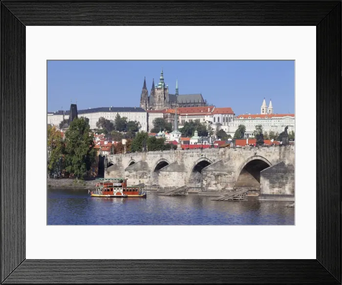 Framed Print : View over the River Vltava with excursion boat to Charles Bridge and the Castle District with St. Vitus Cathedral and Royal Palace, UNESCO World Heritage Site, Prague, Bohemia, Czech Republic, Europe Framed Print : View over the River Vltava with excursion boat to Charles Bridge and the Castle District with St. Vitus Cathedral and Royal Palace, UNESCO World Heritage Site, Prague, Bohemia, Czech Republic, Europe
