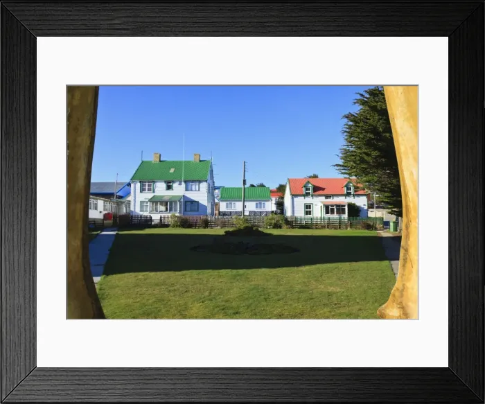 Framed Print : Christ Church cathedral green and houses, seen through whale bone arch, Stanley, East Falkland, Falkland Islands, South America Framed Print : Christ Church cathedral green and houses, seen through whale bone arch, Stanley, East Falkland, Falkland Islands, South America