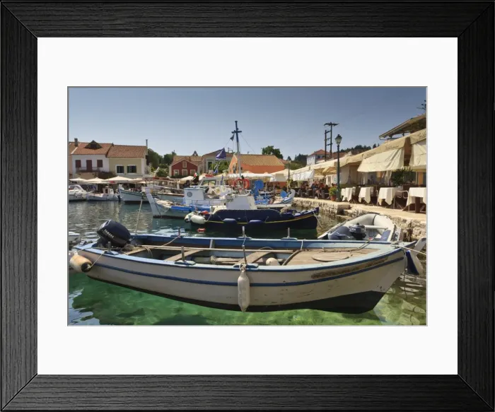 Framed Print : Harbourside with boats, cafes and clear green water, Fiskardo, Kefalonia (Cephalonia), Ionian Islands, Greece Framed Print : Harbourside with boats, cafes and clear green water, Fiskardo, Kefalonia (Cephalonia), Ionian Islands, Greece
