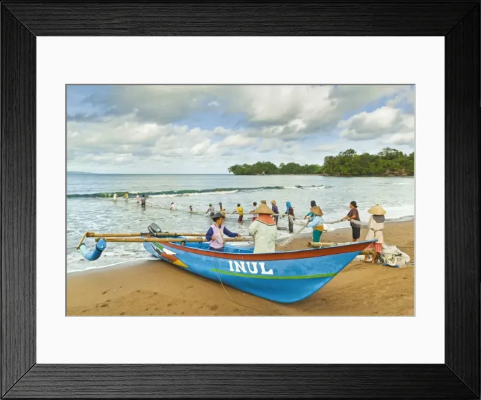 Framed Print : Outrigger fishing boat and people pulling net in by hand to shore near Batu Karas, Pangandaran, West Java, Java, Indonesia, Southeast Asia, Asia Framed Print : Outrigger fishing boat and people pulling net in by hand to shore near Batu Karas, Pangandaran, West Java, Java, Indonesia, Southeast Asia, Asia