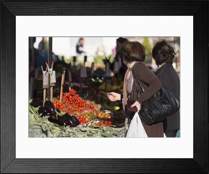 Framed Print : Women shopping in market in Alberobello, Puglia, Italy, Europe Framed Print : Women shopping in market in Alberobello, Puglia, Italy, Europe
