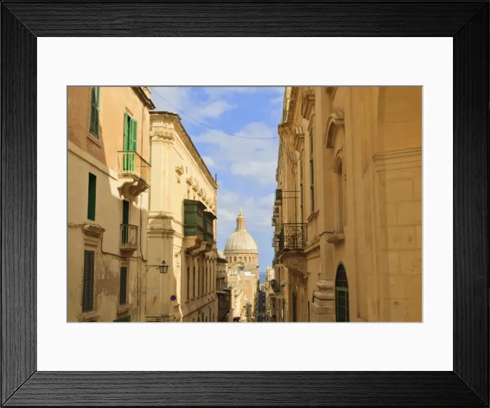 Framed Print : View down a narrow street with golden stone, green shutters and balconies, to the Carmelite Church and its dome, Valletta, Malta, Europe Framed Print : View down a narrow street with golden stone, green shutters and balconies, to the Carmelite Church and its dome, Valletta, Malta, Europe