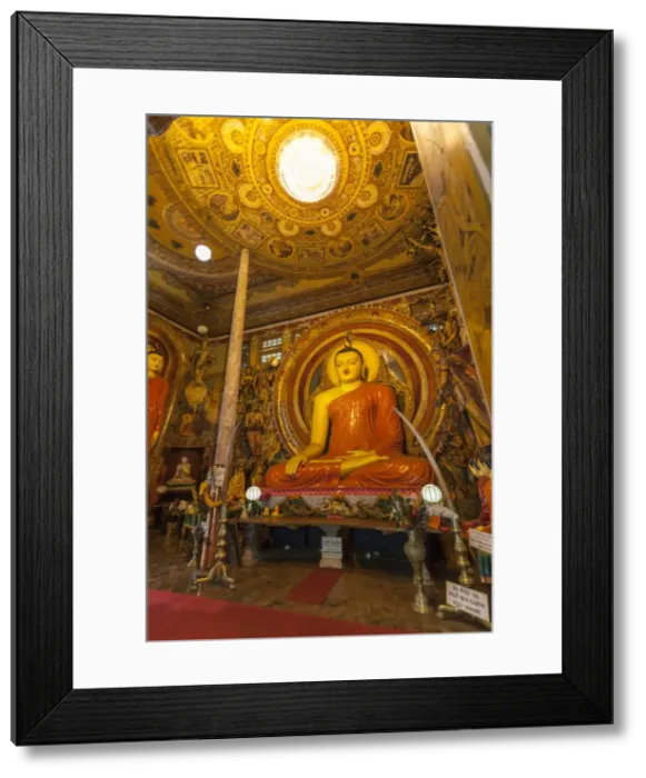 Framed Print : Large Buddhist statue at Gangaramaya Temple, Colombo, Sri Lanka, Asia Framed Print : Large Buddhist statue at Gangaramaya Temple, Colombo, Sri Lanka, Asia