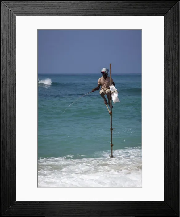 Framed Print : Stilt fisherman using traditional fishing techniques on a wooden pole, Weligama, Sri Lanka, Indian Ocean, Asia Framed Print : Stilt fisherman using traditional fishing techniques on a wooden pole, Weligama, Sri Lanka, Indian Ocean, Asia