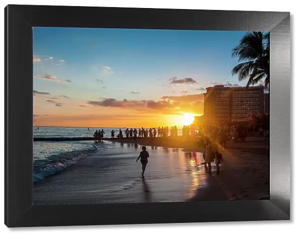 Sunset over the high rise buildings on Waikiki Beach, Oahu, Hawaii, United States of America, Pacific