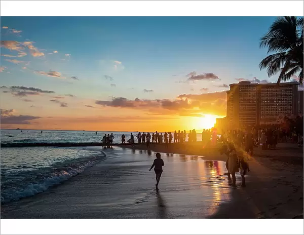 Sunset over the high rise buildings on Waikiki Beach, Oahu, Hawaii, United States of America, Pacific