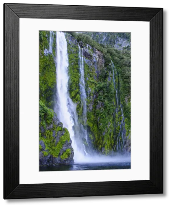 Framed Print : Huge waterfall in Milford Sound, Fiordland National Park, UNESCO World Heritage Site, South Island, New Zealand, Pacific Framed Print : Huge waterfall in Milford Sound, Fiordland National Park, UNESCO World Heritage Site, South Island, New Zealand, Pacific