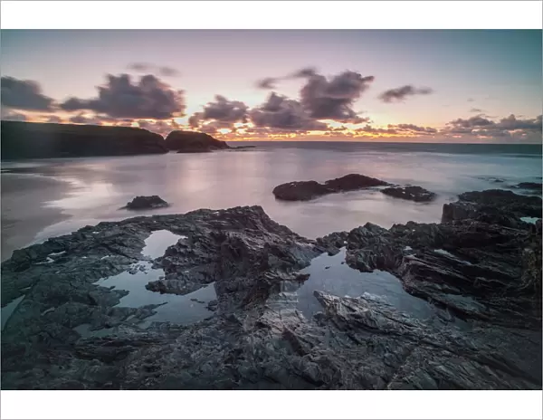 Rocky coast at Treyarnon Bay at sunset, Cornwall, England, United Kingdom, Europe