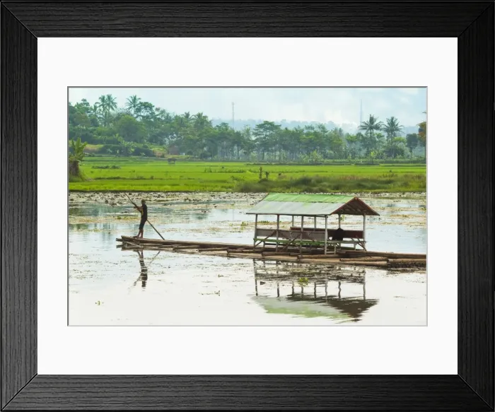 Framed Print : Man punting bamboo raft on Situ Cangkuang lake at this village known for its temple, Kampung Pulo, Garut, West Java, Indonesia, Southeast Asia, Asia Framed Print : Man punting bamboo raft on Situ Cangkuang lake at this village known for its temple, Kampung Pulo, Garut, West Java, Indonesia, Southeast Asia, Asia