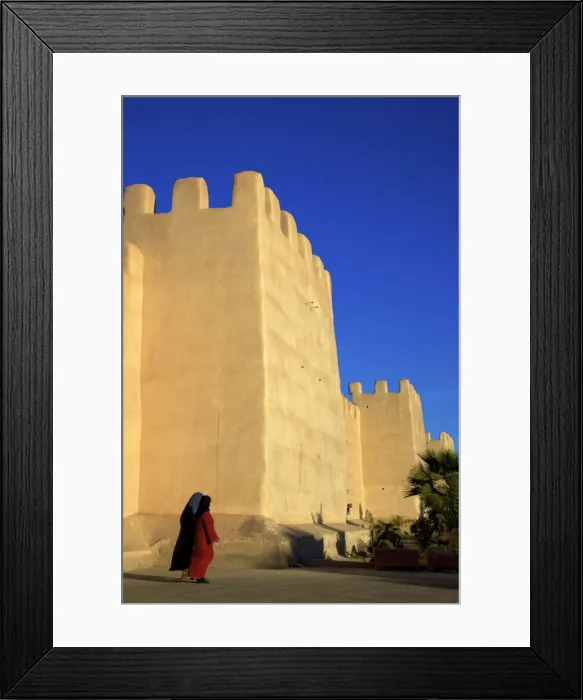 Framed Print : Women in traditional dress with Old City wall, Taroudant, Morocco, North Africa, Africa Framed Print : Women in traditional dress with Old City wall, Taroudant, Morocco, North Africa, Africa