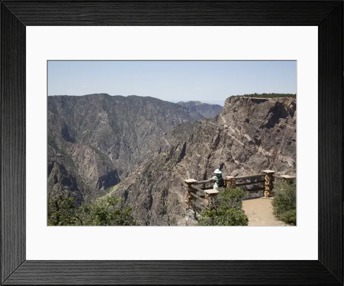 Framed Print : Visitor at Painted Wall View Point, Gunnison River deep in the canyon, Black Canyon of the Gunnison National Park, Colorado, United States of America, North America Framed Print : Visitor at Painted Wall View Point, Gunnison River deep in the canyon, Black Canyon of the Gunnison National Park, Colorado, United States of America, North America