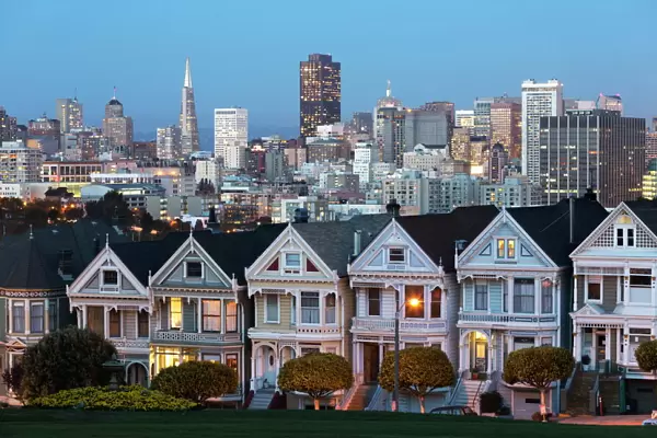 The Painted Ladies and the city at dusk, Alamo Square, San Francisco, California, United States of America, North America