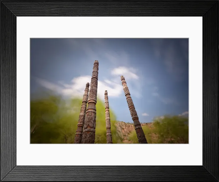 Framed Print : Naxi poles with wood carvings with moving clouds in a long exposure, Lijiang, Yunnan, China, Asia Framed Print : Naxi poles with wood carvings with moving clouds in a long exposure, Lijiang, Yunnan, China, Asia