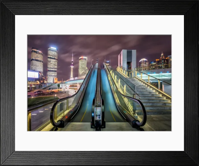 Framed Print : A modern, open-air escalator with Pudong cityscape at night, Shanghai, China, Asia Framed Print : A modern, open-air escalator with Pudong cityscape at night, Shanghai, China, Asia