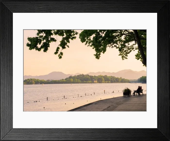 Framed Print : West Lake shore with hilly landscape and silhouettes, Hangzhou, Zhejiang, China, Asia Framed Print : West Lake shore with hilly landscape and silhouettes, Hangzhou, Zhejiang, China, Asia