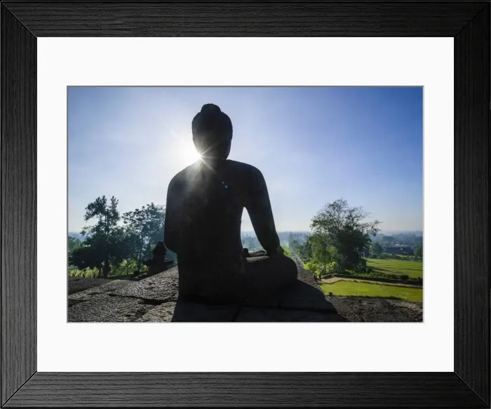 Framed Print : Backlight of a sitting Buddha in the temple complex of Borobodur, UNESCO World Heritage Site, Java, Indonesia, Southeast Asia, Asia Framed Print : Backlight of a sitting Buddha in the temple complex of Borobodur, UNESCO World Heritage Site, Java, Indonesia, Southeast Asia, Asia